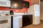 Full kitchen with dishwasher, microwave, standard 12 cup coffee maker 